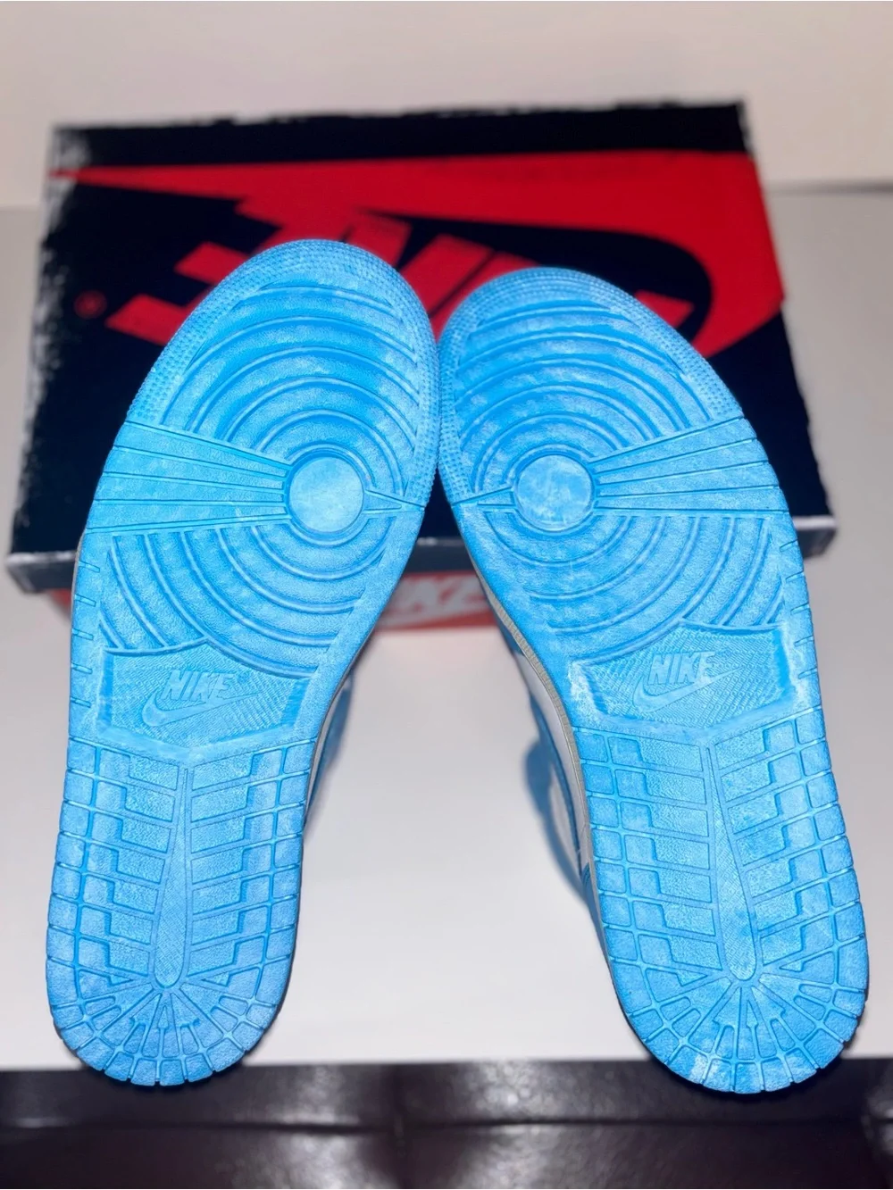Jordan Air Jordan 1 Mid White and Blue Sneakers